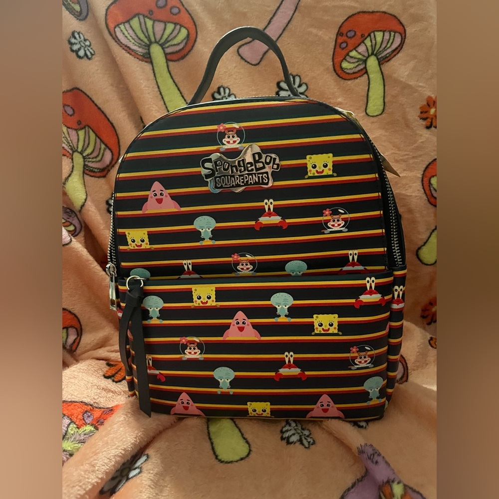 SpongeBob square pants back pack and matching wallet from box lunch.